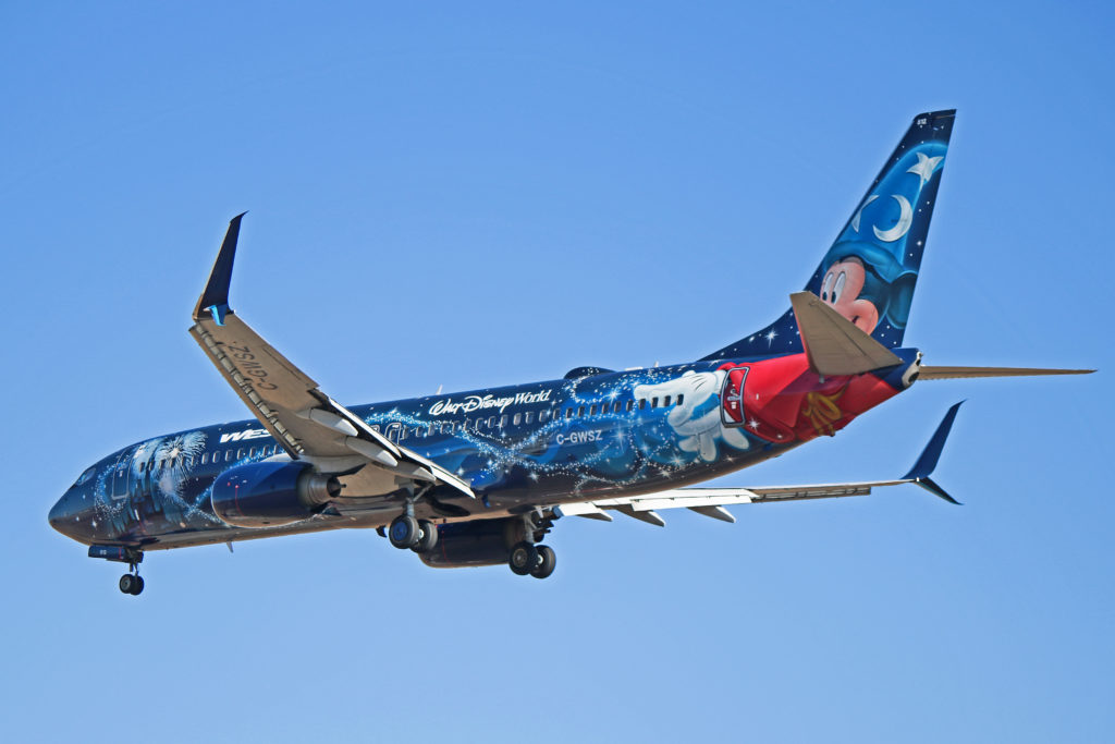 C Gwsz Westjet Boeing 737 800 Disney Magic Plane