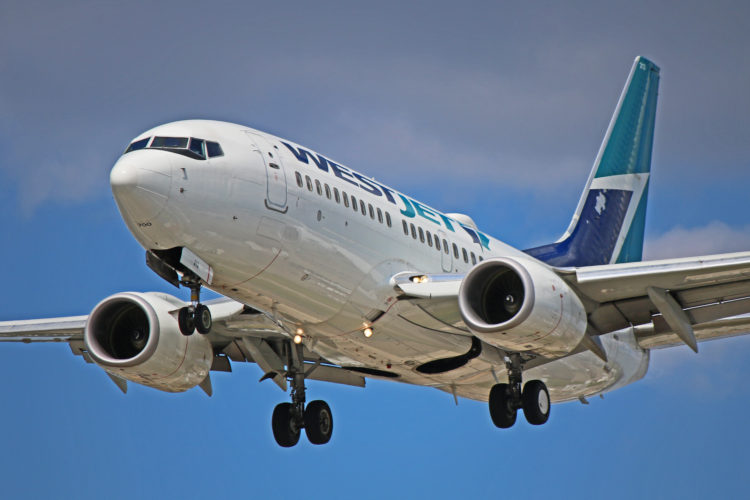 C-FWCN: WestJet Boeing 737-700 (New To Airline In 2003)